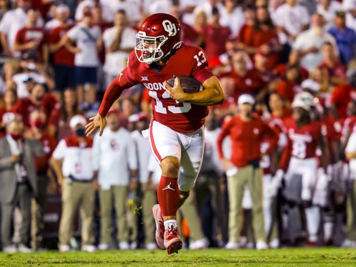 Oklahoma QB Caleb Williams runs with the ball